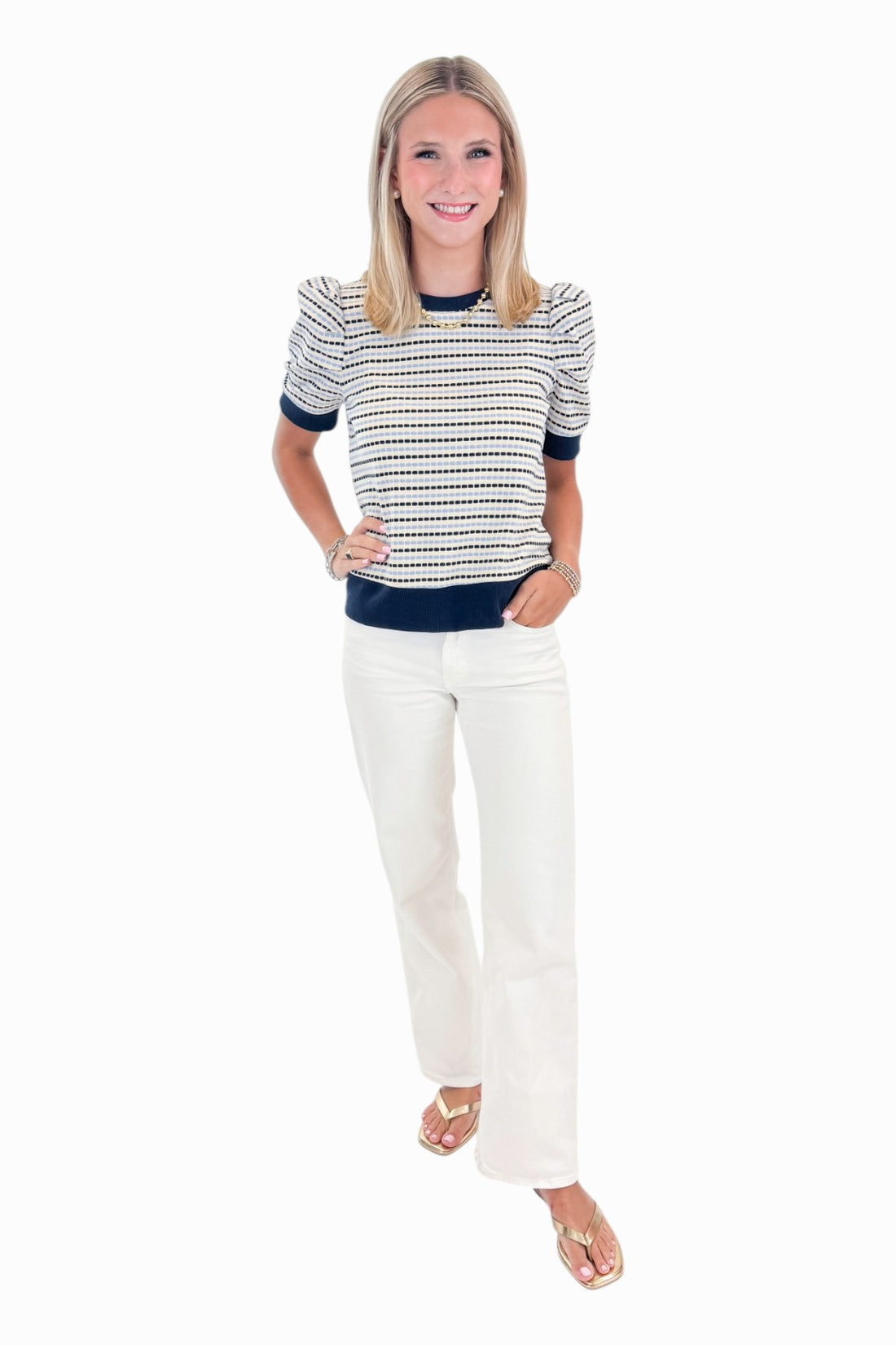 Front view of woman wearing Swagger Boutique’s Navy &amp; Light Blue Striped Short Sleeve Top by Entro with jeans against white studio background.