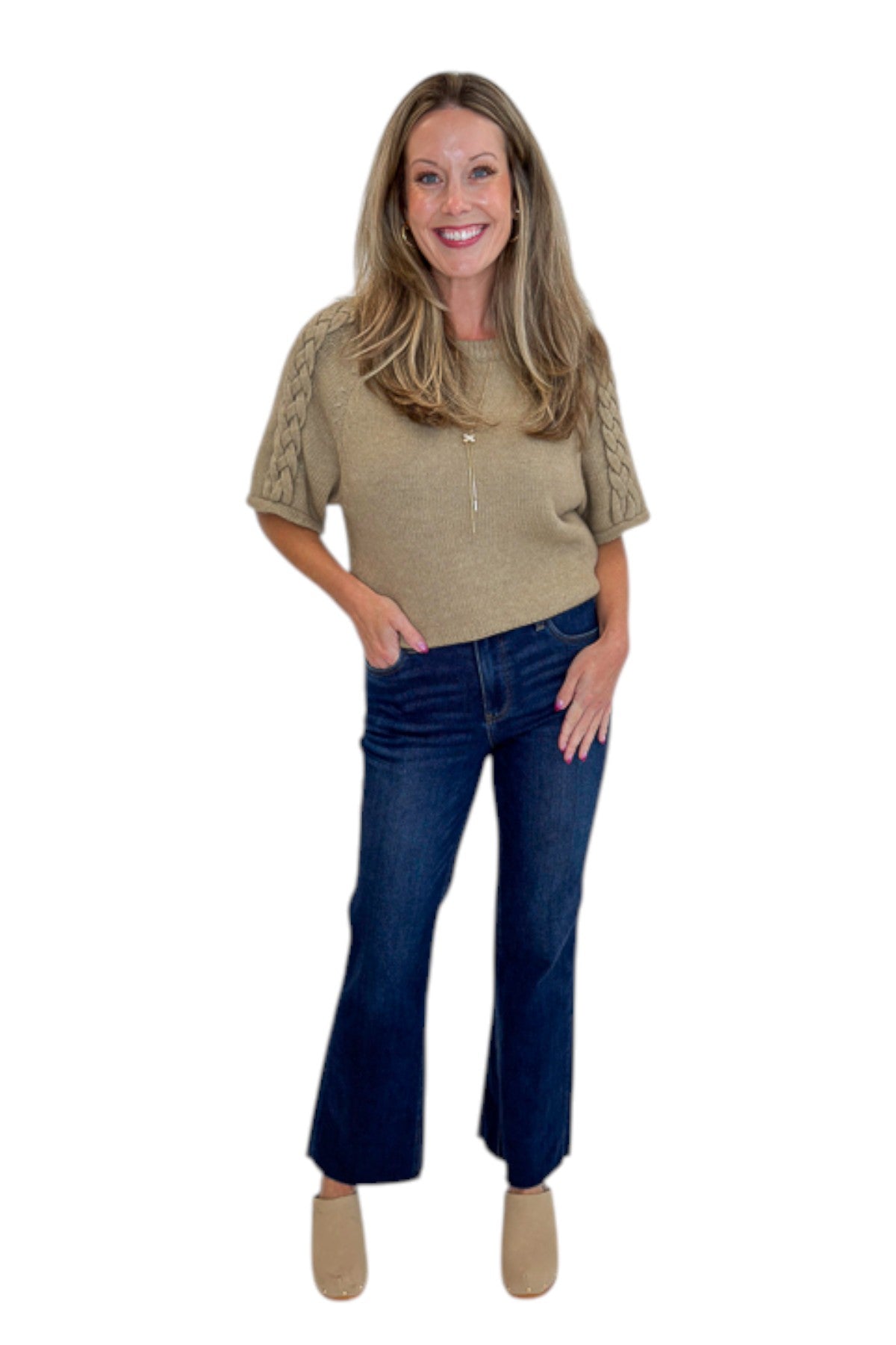 Front view of woman wearing Oatmeal Braid Detail Short Sleeve Sweater by Entro with jeans against white studio background.