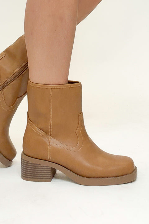 Oberon- Natural Booties side view against white studio background.