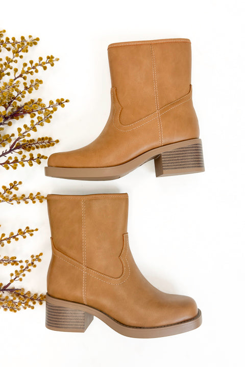 Oberon- Natural Booties side view against white studio background.