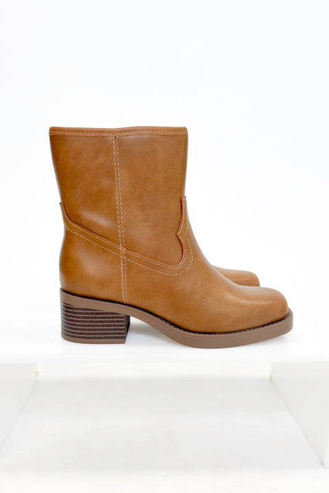 Oberon- Natural Booties side view against white studio background.