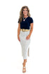 Front detail view of woman wearing Swagger Boutique’s Off White & Navy Striped Midi Skirt With Slit and navy top against white studio background.