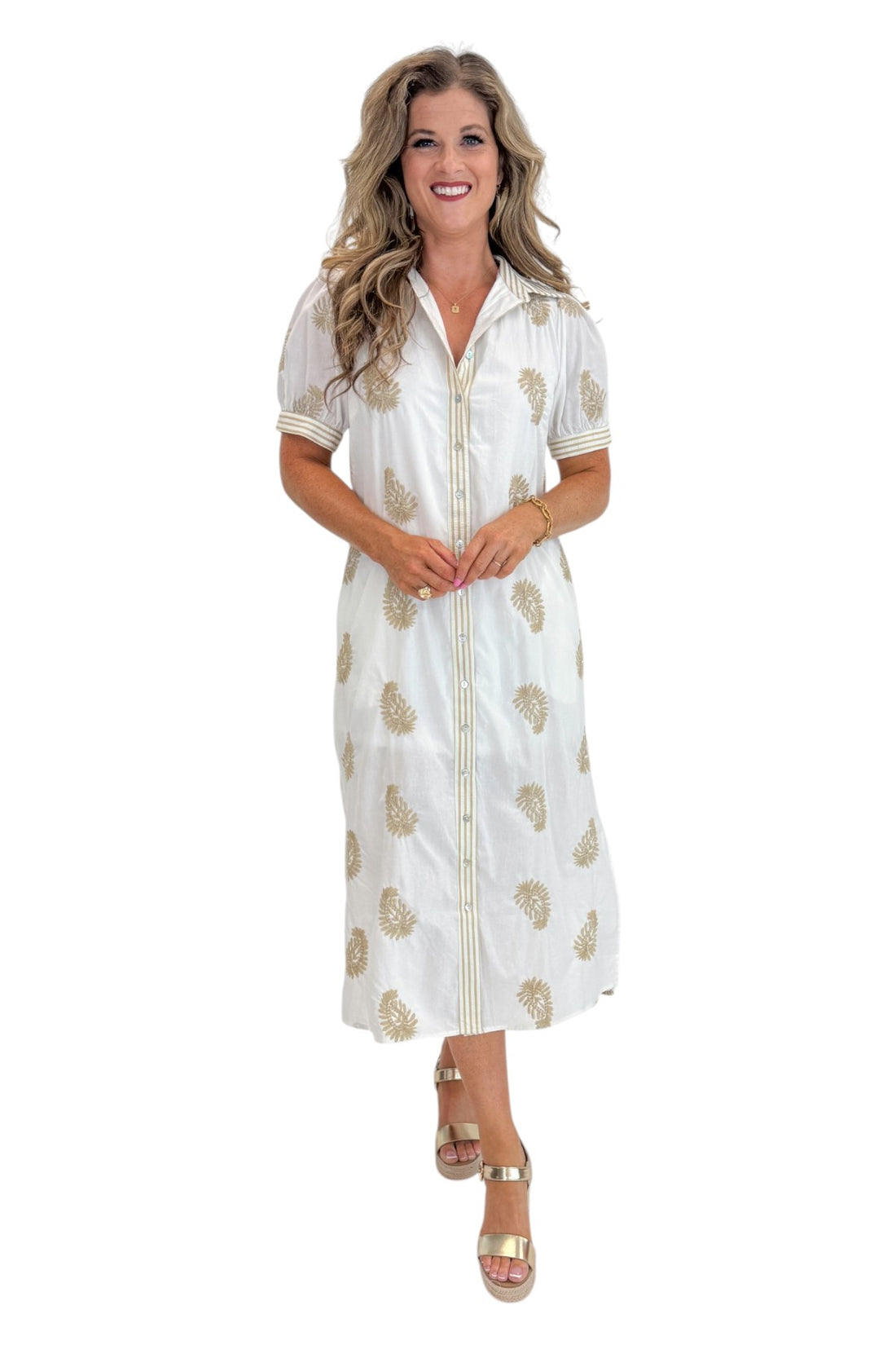 Front view of woman wearing Swagger Boutique’s Off White &amp; Taupe Embroidered Midi Dress with sandals against white studio background.