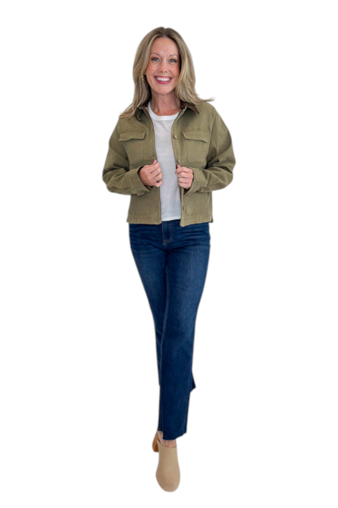 Front view of woman wearing Swagger Boutique’s Olive Barn Jacket With Corduroy Collar with jeans against white studio background.