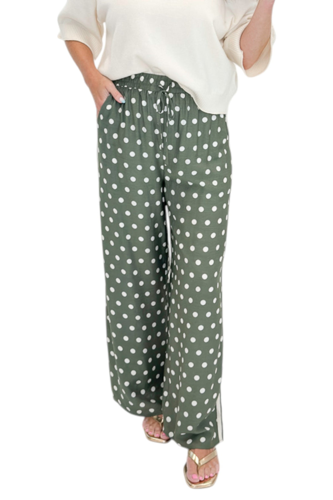 Front view of woman wearing Swagger Boutique’s Cream 3/4 Sleeve Lightweight Sweater by Entro with Olive Polka Dot Stripe Trim Pants by Entro against white studio background.