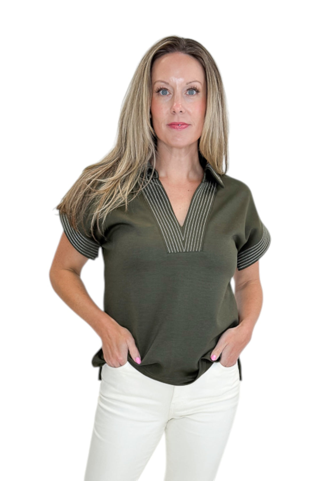 Front view of woman wearing Swagger Boutique’s Olive Stitched Short Sleeve Top by Entro with jeans against white studio background.