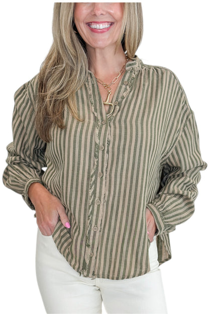Front detail view of woman wearing Swagger Boutique’s Olive Striped Button Up Top with jeans against white studio background.