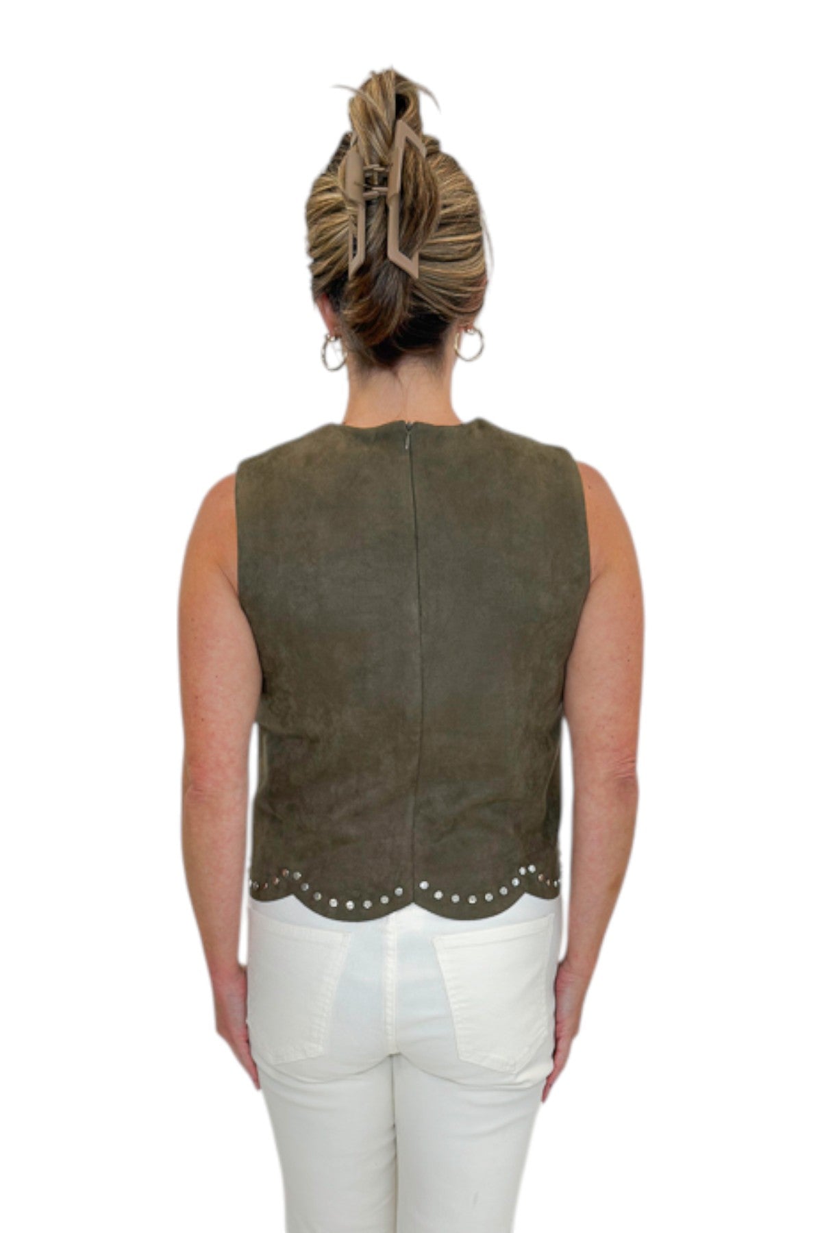 Back view of woman wearing Swagger Boutique’s Olive Suede Stud Tank with Kelsey Ecru Jeans against white studio background.