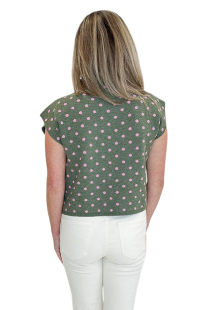 Back view of woman wearing Swagger Boutique’s Olive &amp; Pink Polka Dot Sleeveless Sweater by Entro with jeans against white studio background.