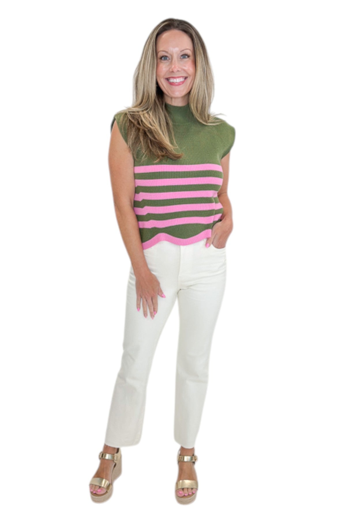 Front view of woman wearing Swagger Boutique’s Olive &amp; Pink Scallop Hem Sleeveless Sweater by Entro with jeans against white studio background.