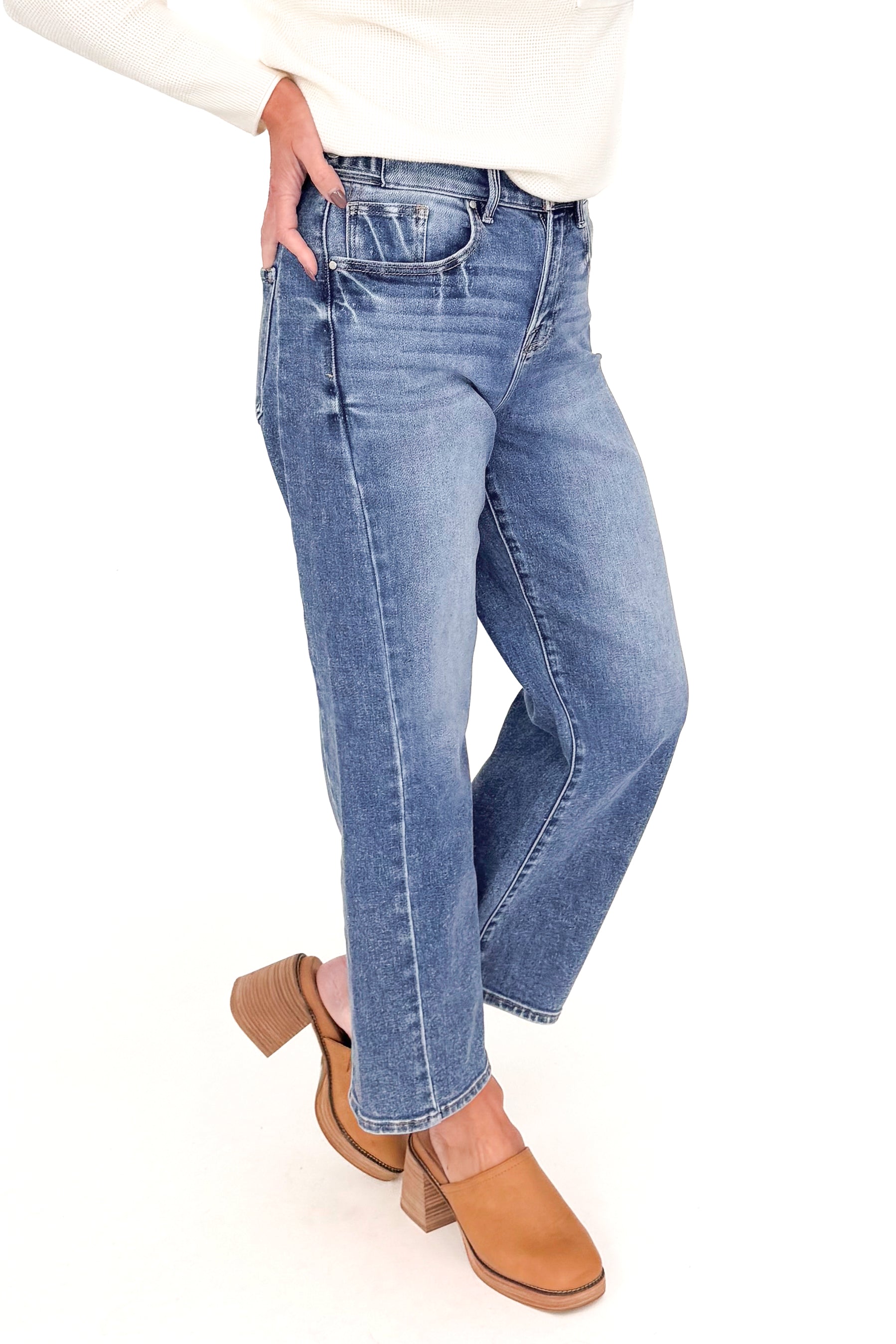 Katie medium wash adjustable waist barrel jeans by Risen - side view on model
