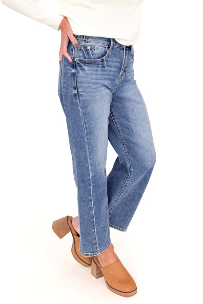 Katie medium wash adjustable waist barrel jeans by Risen - side view on model