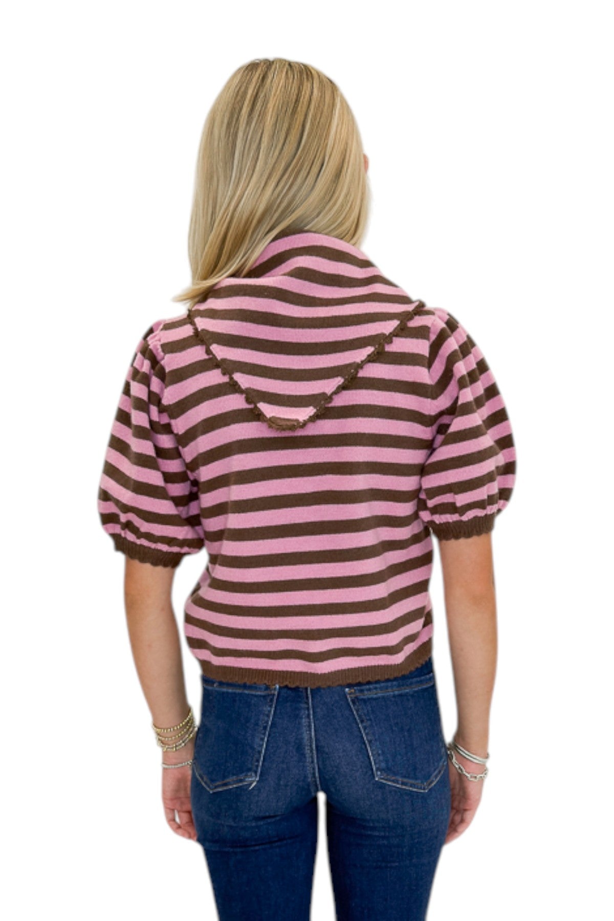 Back view of woman wearing Swagger Boutique’s Pink &amp; Brown Striped Faux Tie Short Sleeve Sweater by Entro with jeans against white studio background.