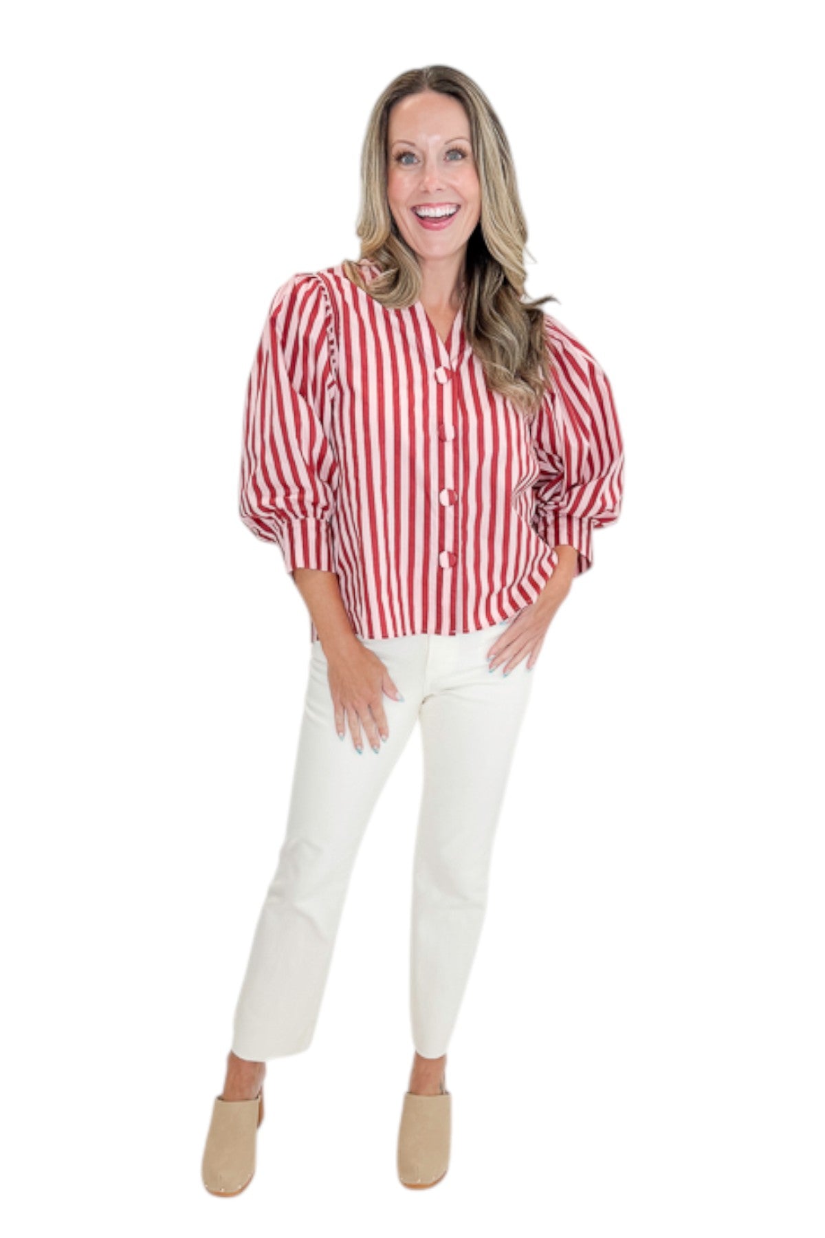 Front view of woman wearing Swagger Boutique’s Pink &amp; Wine Striped Puff Sleeve Top with jeans against white studio background.