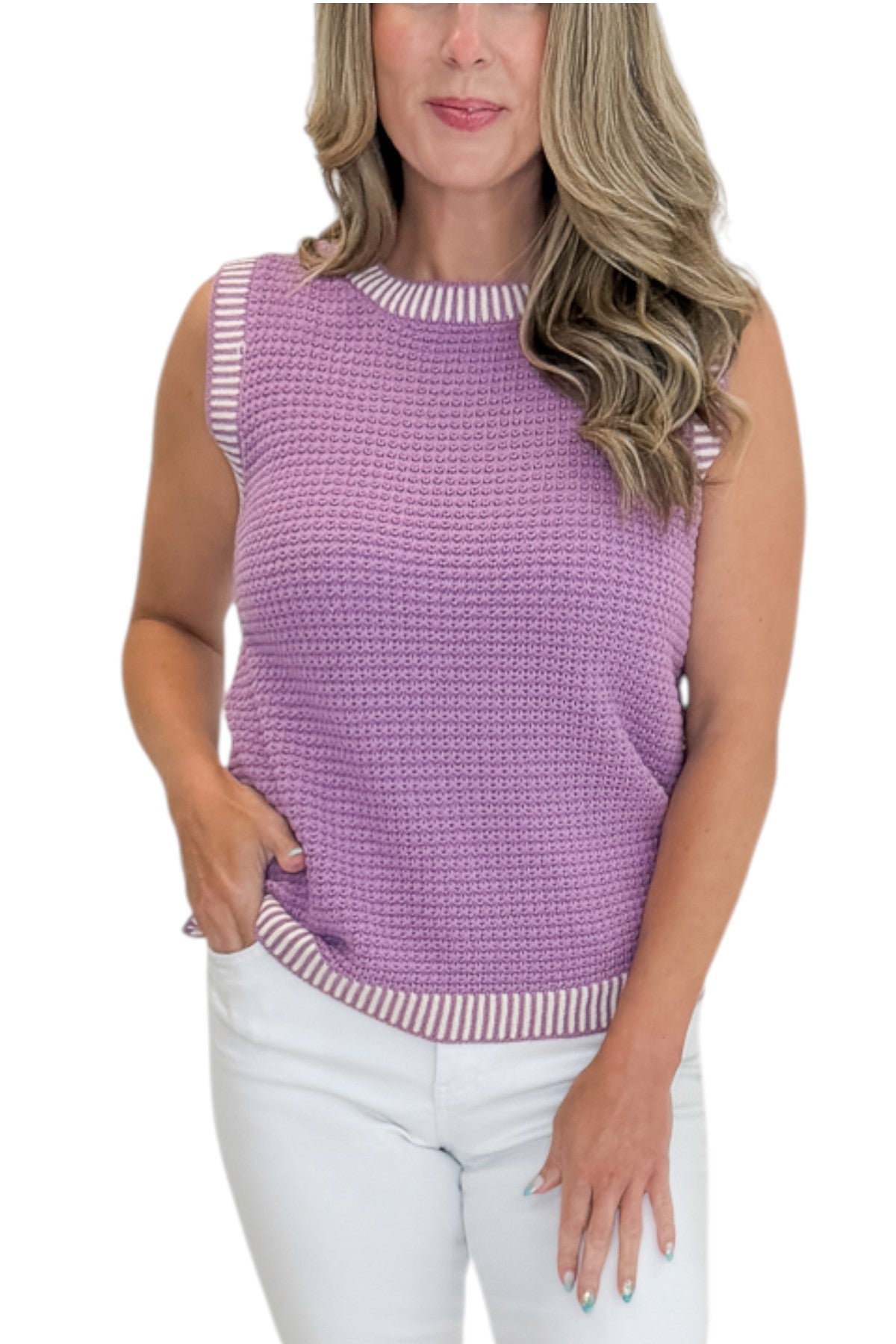 Front detail view of woman wearing Swagger Boutique’s Purple &amp; White Textured Sweater Tank with jeans against white studio background.
