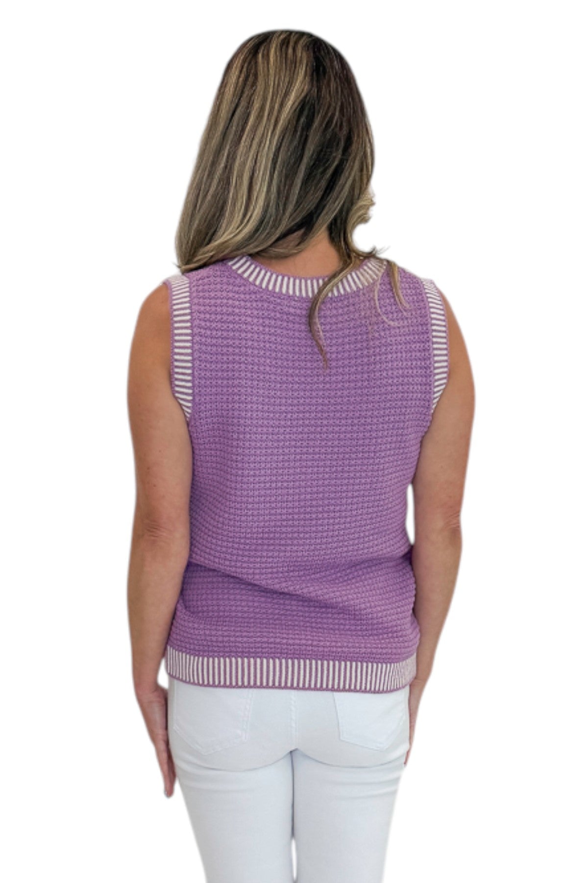 Back view of woman wearing Swagger Boutique’s Purple &amp; White Textured Sweater Tank with jeans against white studio background.