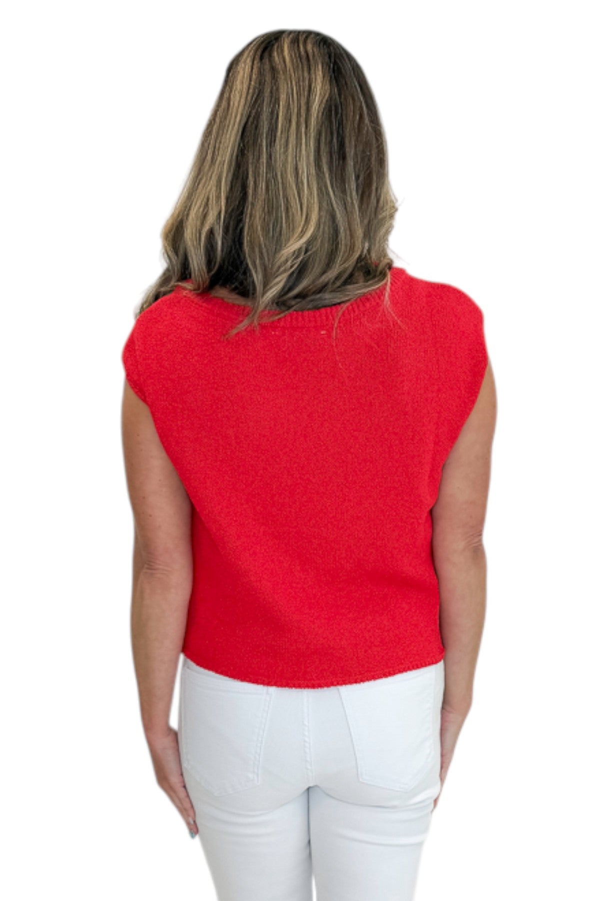 Back view of woman wearing Swagger Boutique’s Red Cap Sleeve Sweater with jeans against white studio background.