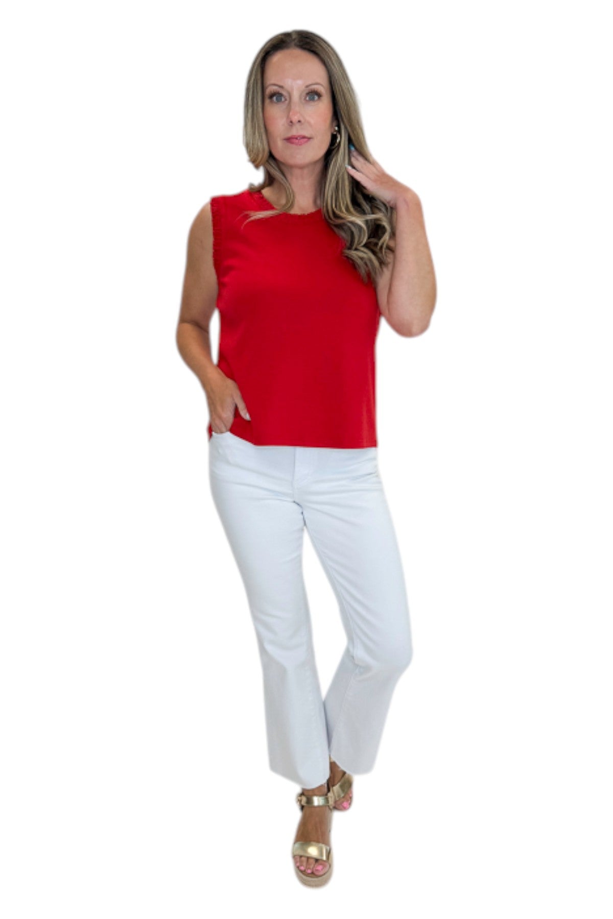 Front view of woman wearing Swagger Boutique’s Red Smocked Trim Tank with jeans against white studio background.