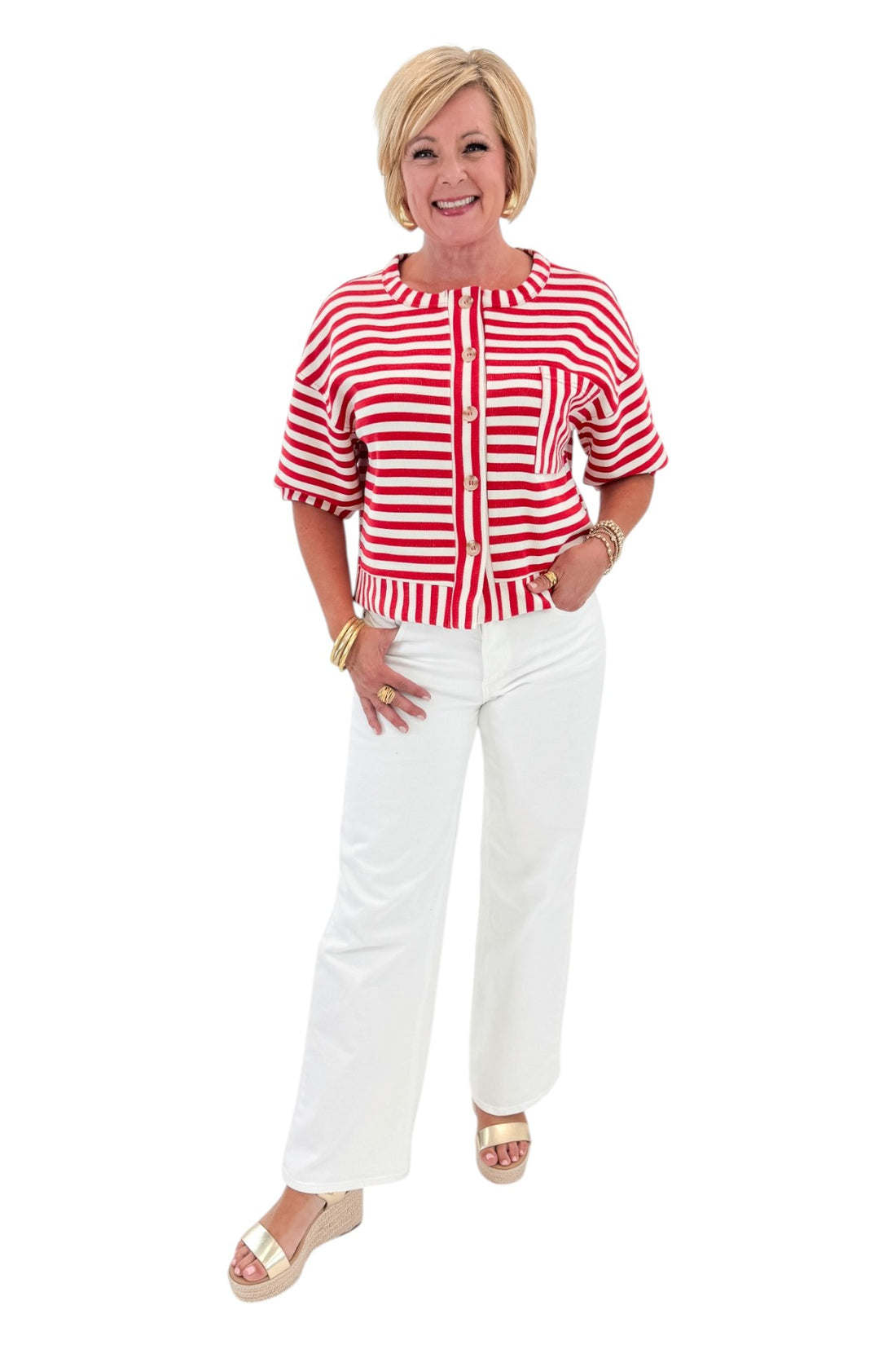 Front view of woman wearing Swagger Boutique’s Red Striped Short Sleeve Button Up Top with jeans against white studio background.