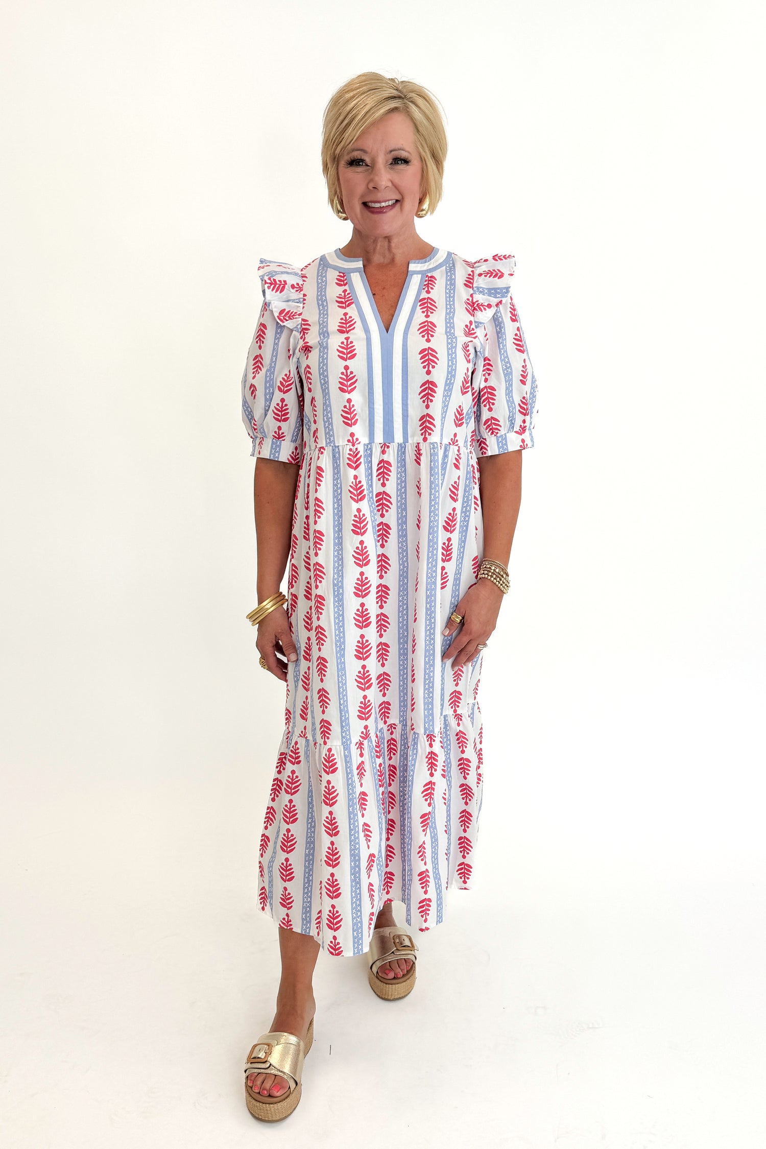 Front view of woman wearing Swagger Boutique’s Red, White &amp; Blue Jonah Midi Dress by MudPie with Lulah Platform Sandals against white studio background.