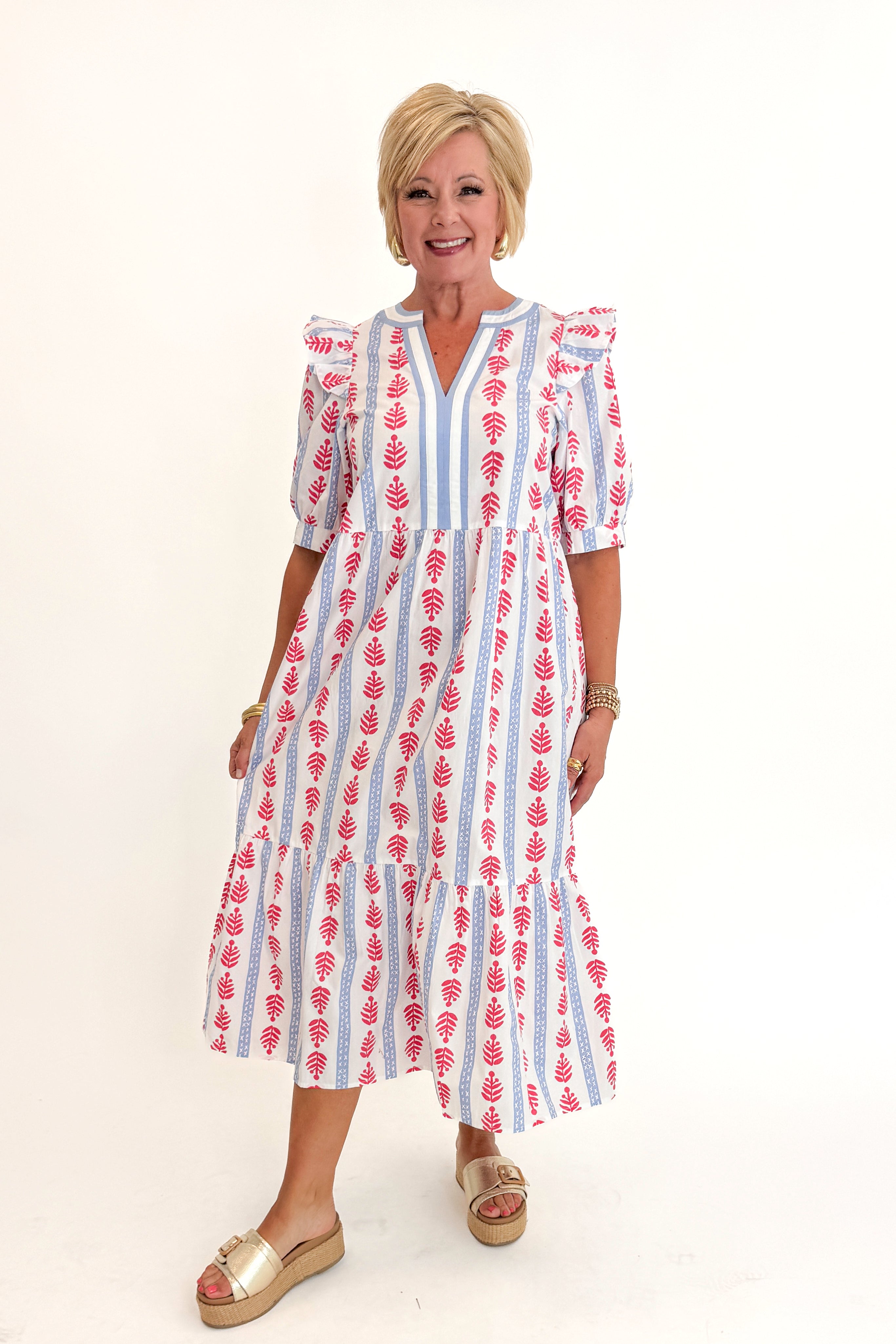 Front view of woman wearing Swagger Boutique’s Red, White &amp; Blue Jonah Midi Dress by MudPie with Lulah Platform Sandals against white studio background.