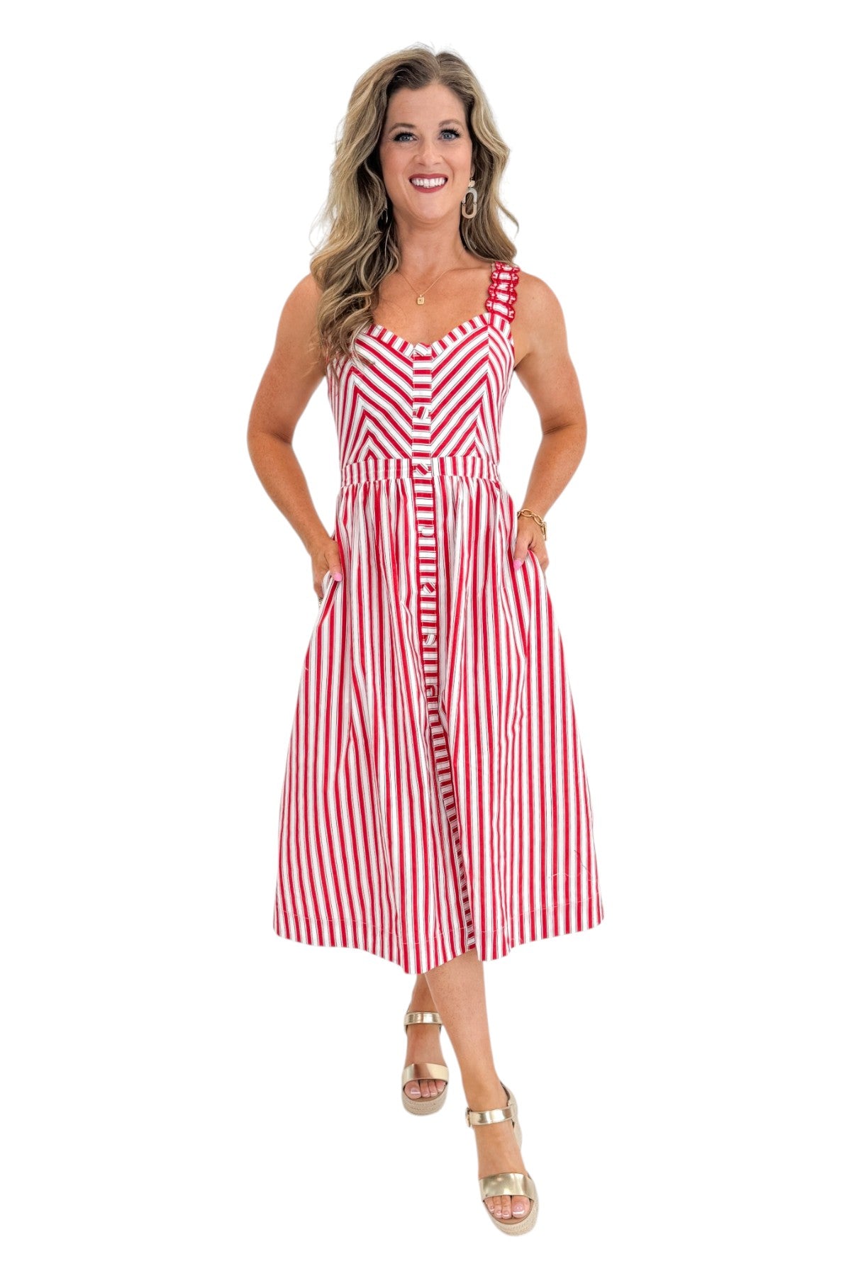 Front view of woman wearing Swagger Boutique’s Red, White &amp; Blue Striped Midi Dress with sandals against white studio background.