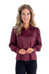 Front view of woman wearing Plum Satin Button Up Top with jeans against white studio background.