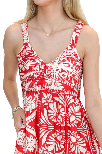 Front detail view of woman wearing Red Printed Sleeveless V-neck Maxi Dress against white studio background.