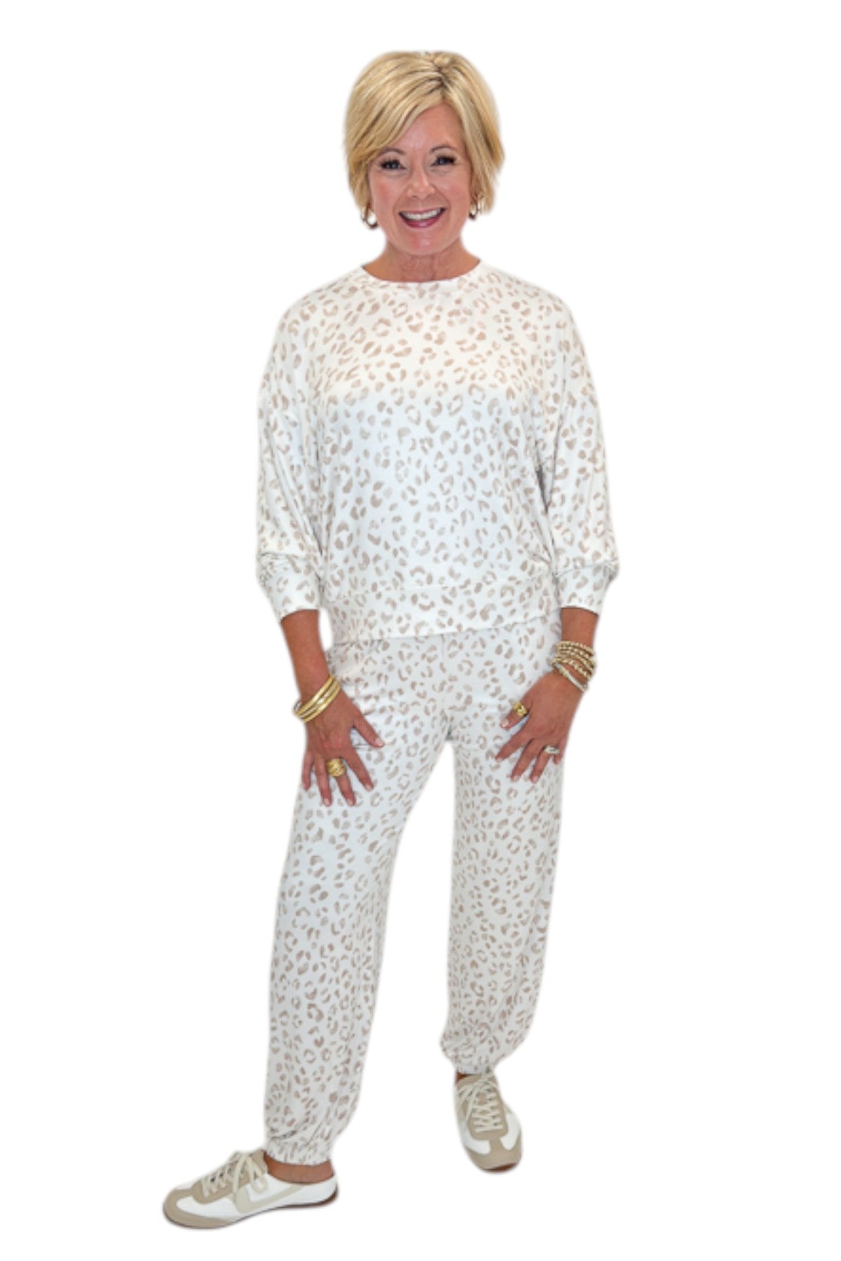 Front view of woman wearing Swagger Boutique’s Sandstone Soft Leo Long Sleeve Top with matching Joggers by Z Supply against white studio background.