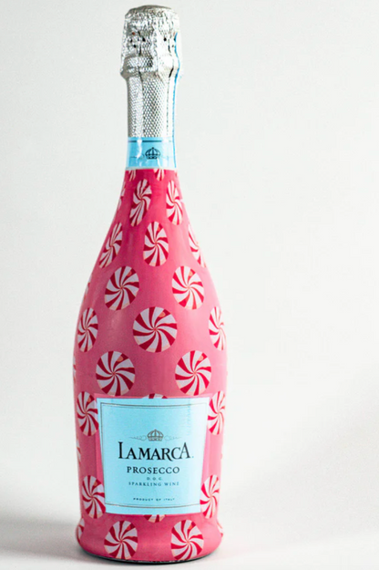 Pink bottle with candy cane pattern and &
