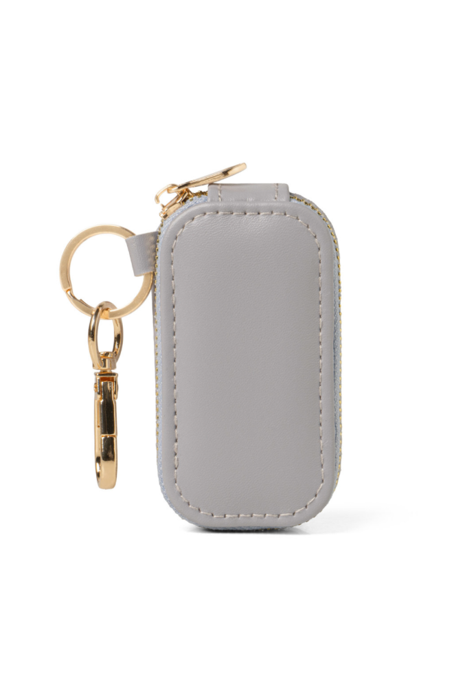 Gray keychain pouch with gold keychain on a white background
