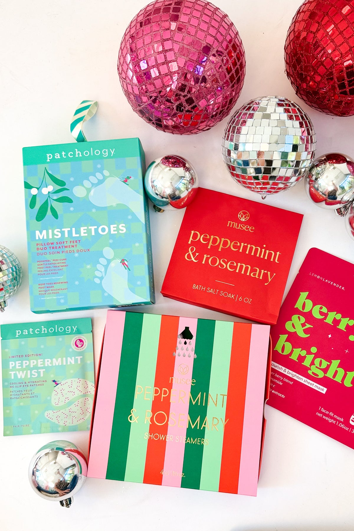 Peppermint Twist Eye Gels and other Spa Items against holiday studio background.