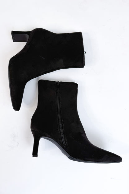 Swan- Black Suede Booties side view against white studio background.
