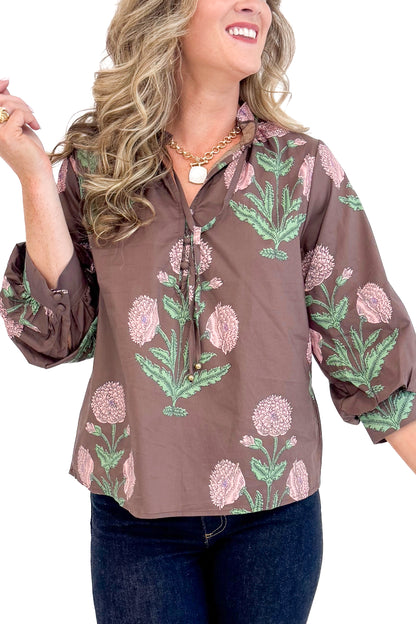 Woman wearing New Crush Brown Floral Printed 3/4 Sleeve Top by Entro - front detailed view showing beautiful floral print pattern and 3/4 sleeves