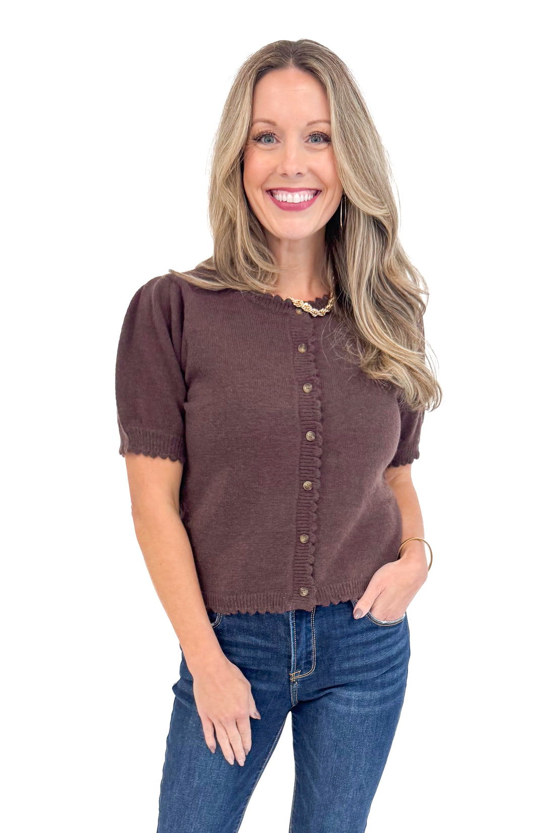 Woman wearing Merlot Mood Chocolate Scallop Detail Short Sleeve Cardigan by Entro - front view showing scalloped edges and short sleeve.