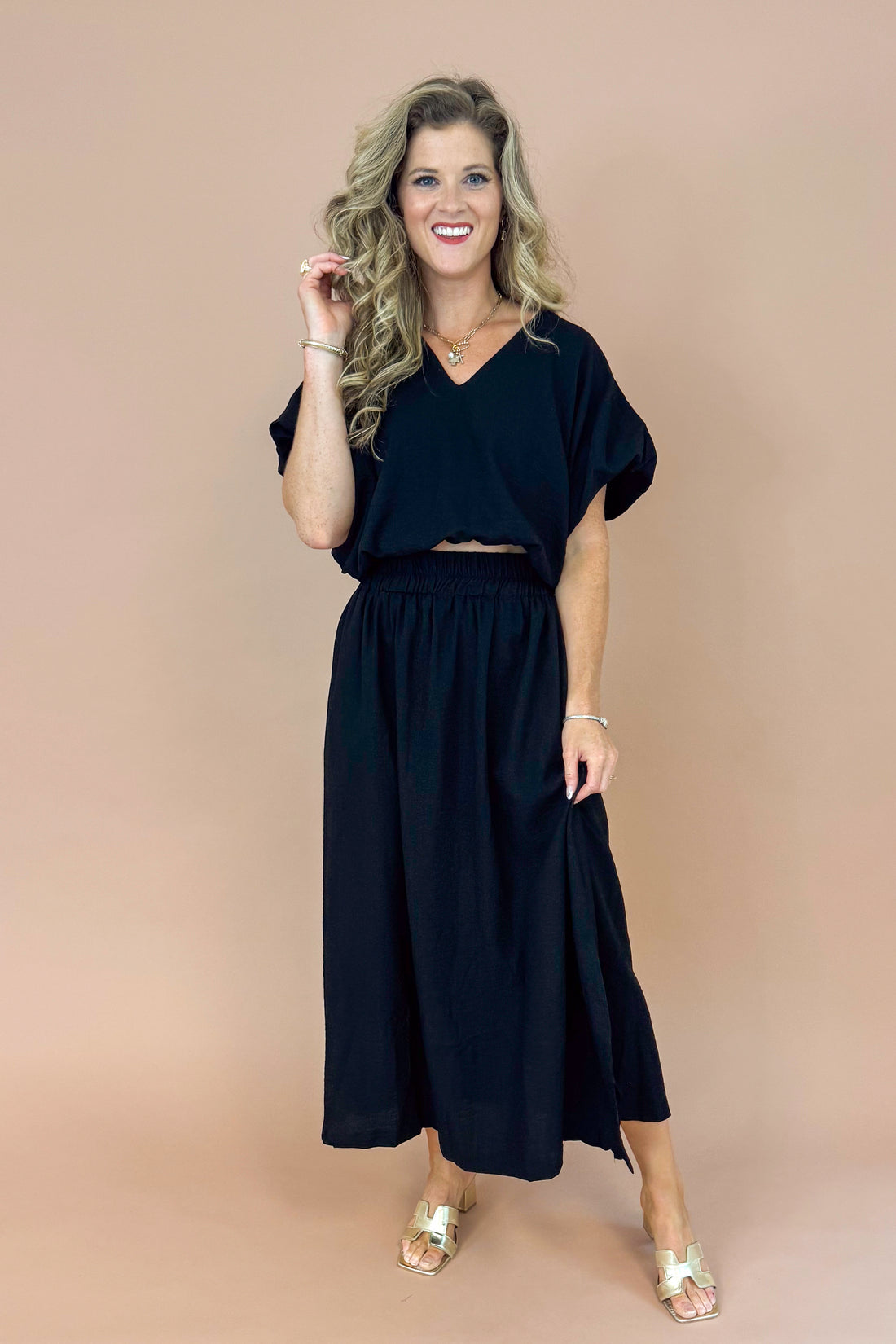 Jet Set Black V-neck Bubble Hem Top by Entro