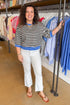 Front view of woman wearing Black Striped With Blue Lining 3/4 Sleeve Sweatshirt by Entro at a boutique.