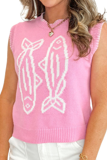 Front detail view of woman wearing Light Pink Sardine Sweater Tank by Entro with jean shorts against white studio background.