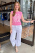 Front view of woman wearing Light Pink Sardine Sweater Tank by Entro with jeans at Swagger Boutique.