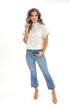 Front view of woman wearing Linen Stitch Detail Collared Top by Entro with jeans against white studio background.