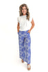Front view of woman wearing Blue Floral Print Wide Leg Pants with top against white studio background.