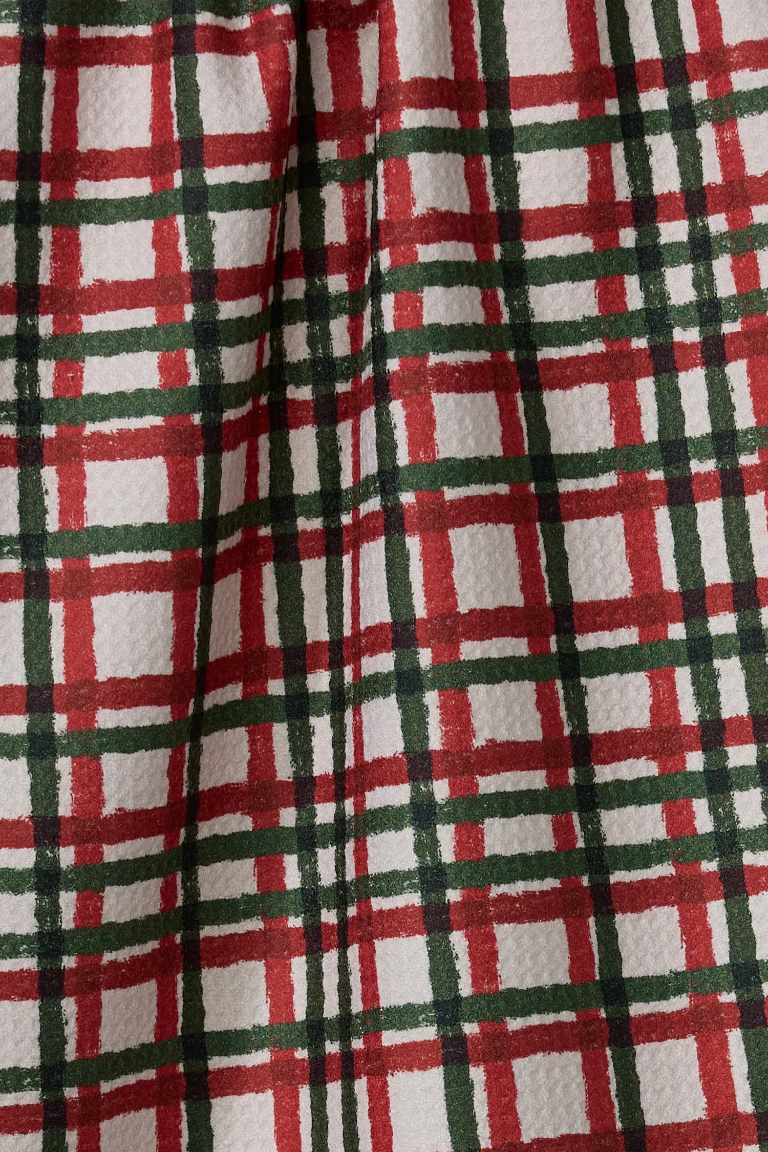 Close-up of red, green, and white plaid fabric