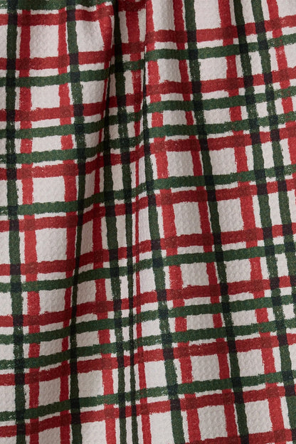 Close-up of red, green, and white plaid fabric