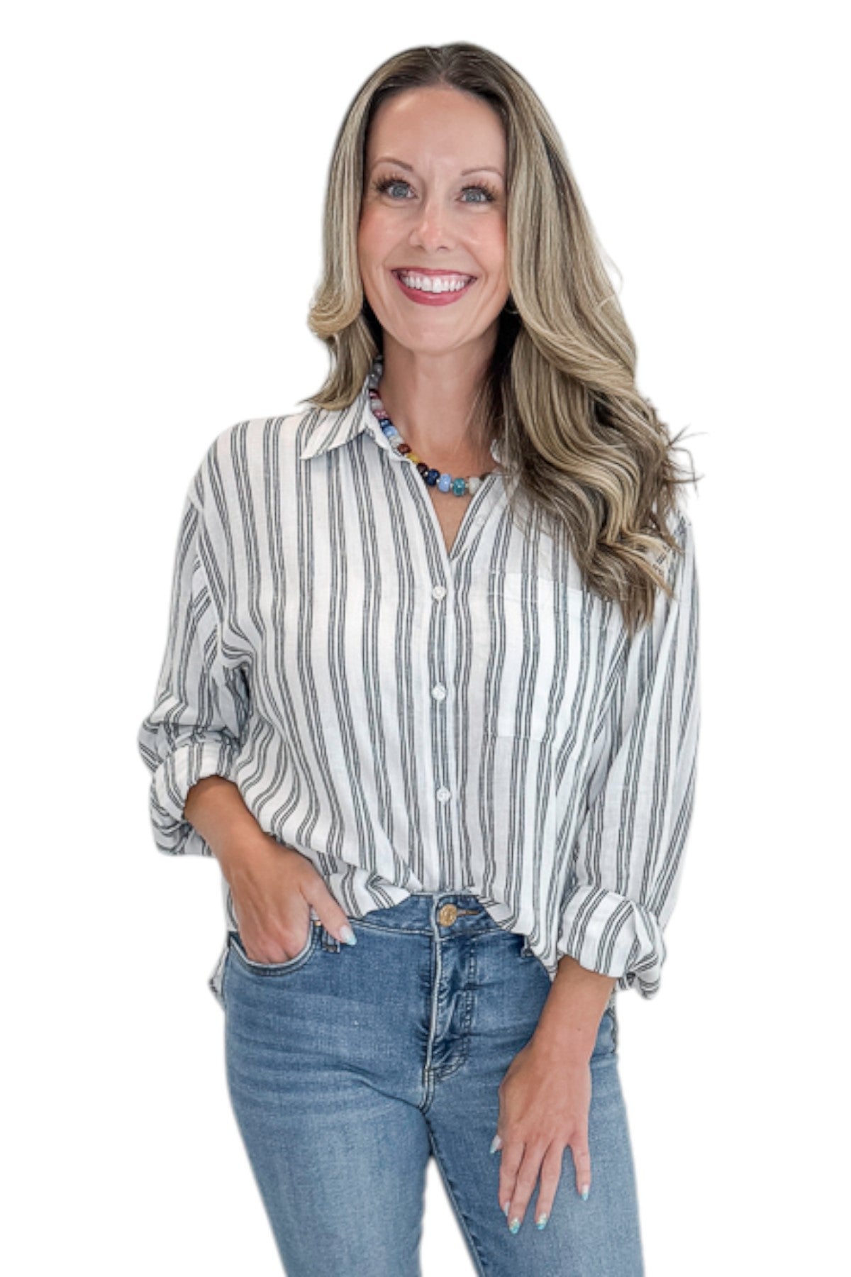 Front view of woman wearing Swagger Boutique’s White The Perfect Striped Button Up Top by Z Supply with jeans against white studio background.