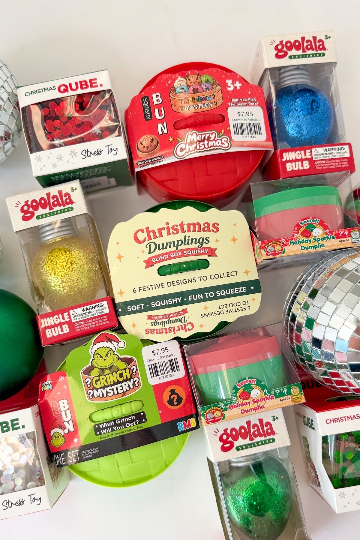 Holiday blind boxes and toys against studio background