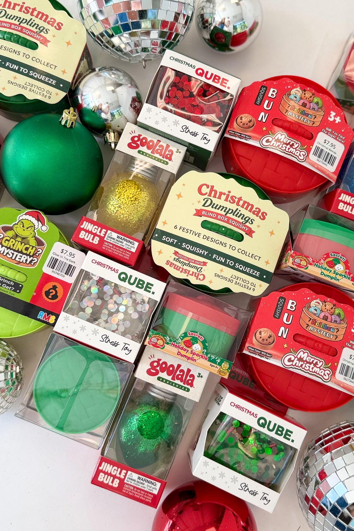Holiday Toys and Blind Boxes against holiday background.