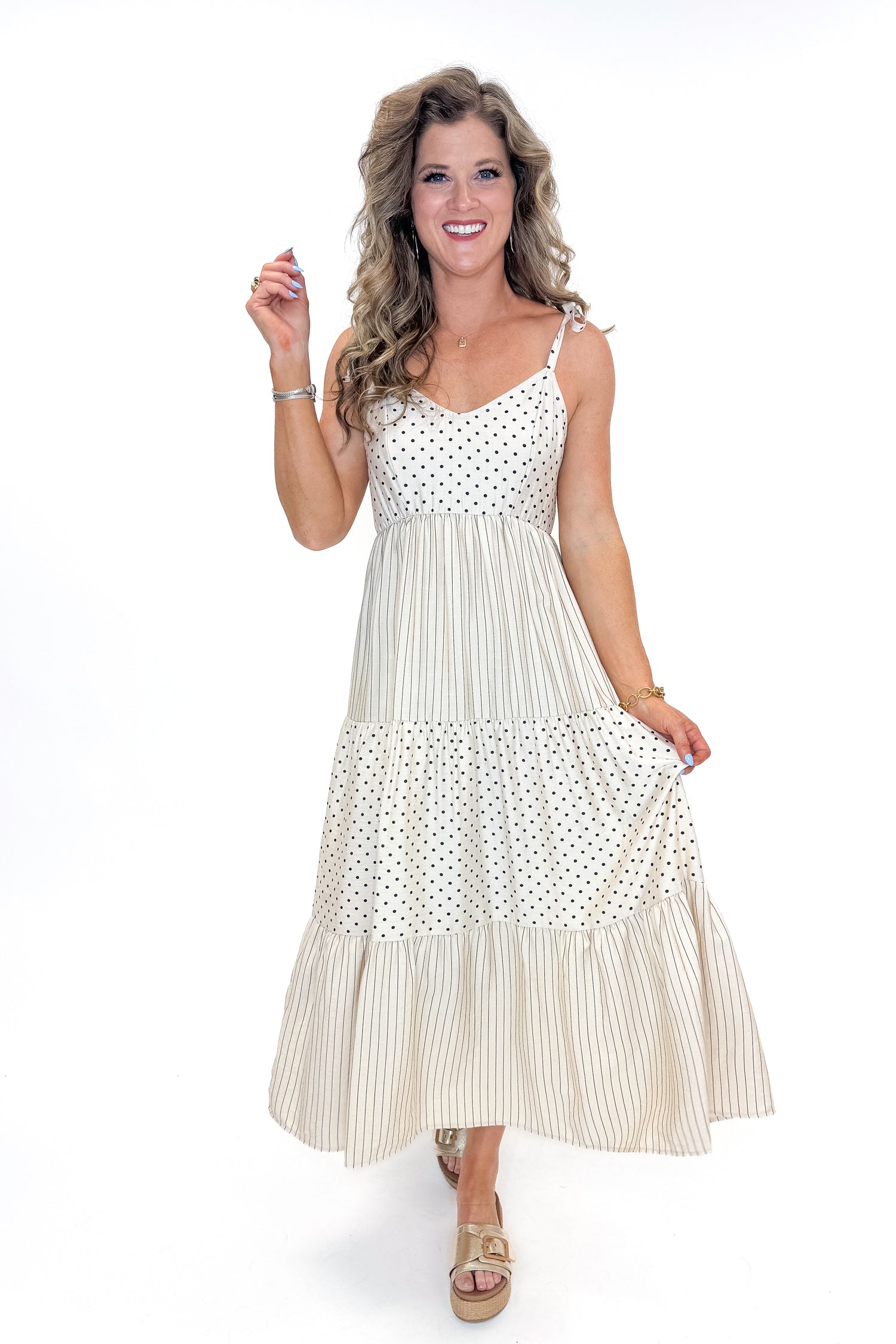 Front view of woman wearing Natural Striped &amp; Polka Dot Midi Dress with sandals against white studio background.