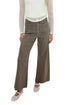 Front view of woman wearing Swagger Boutique’s Washed Brown Patch Pocket Wide Leg Jeans with top against white studio background.