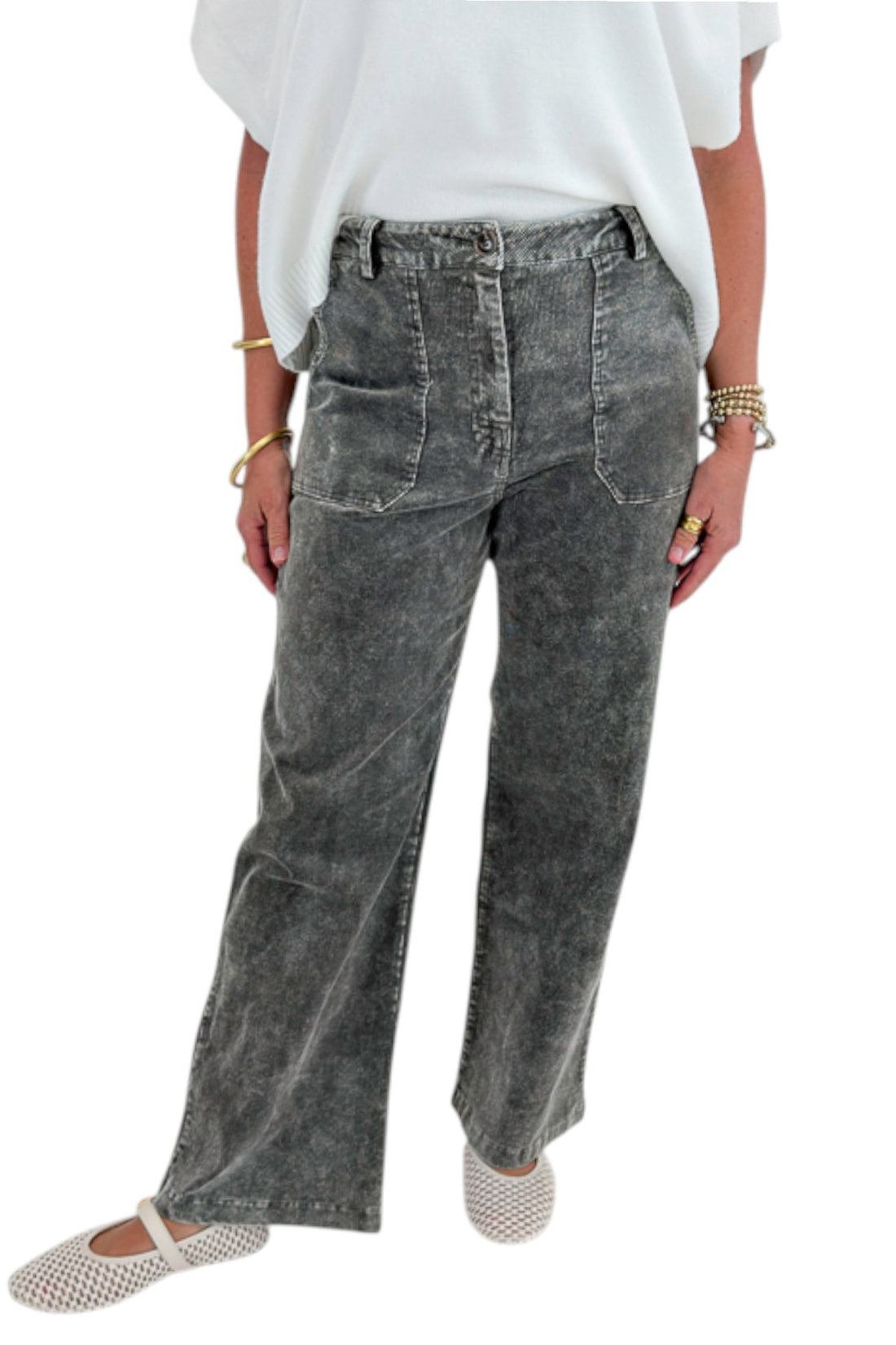 Front detail view of woman wearing Swagger Boutique’s Ivory Light Weight Short Sleeve Sweater with Washed Stone Corduroy Pants against white studio background.