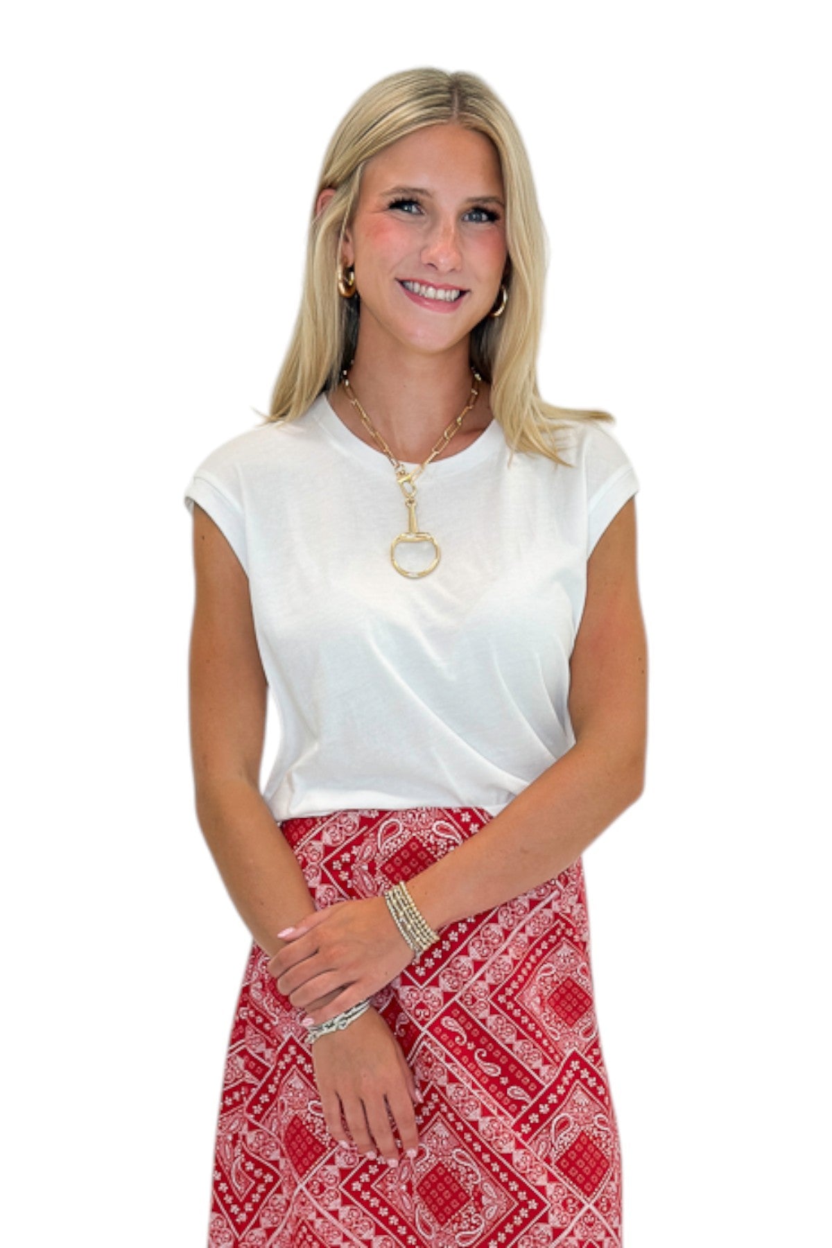 Front view of woman wearing Swagger Boutique’s White Flex Sleeveless Tee by Z Supply against white studio background.